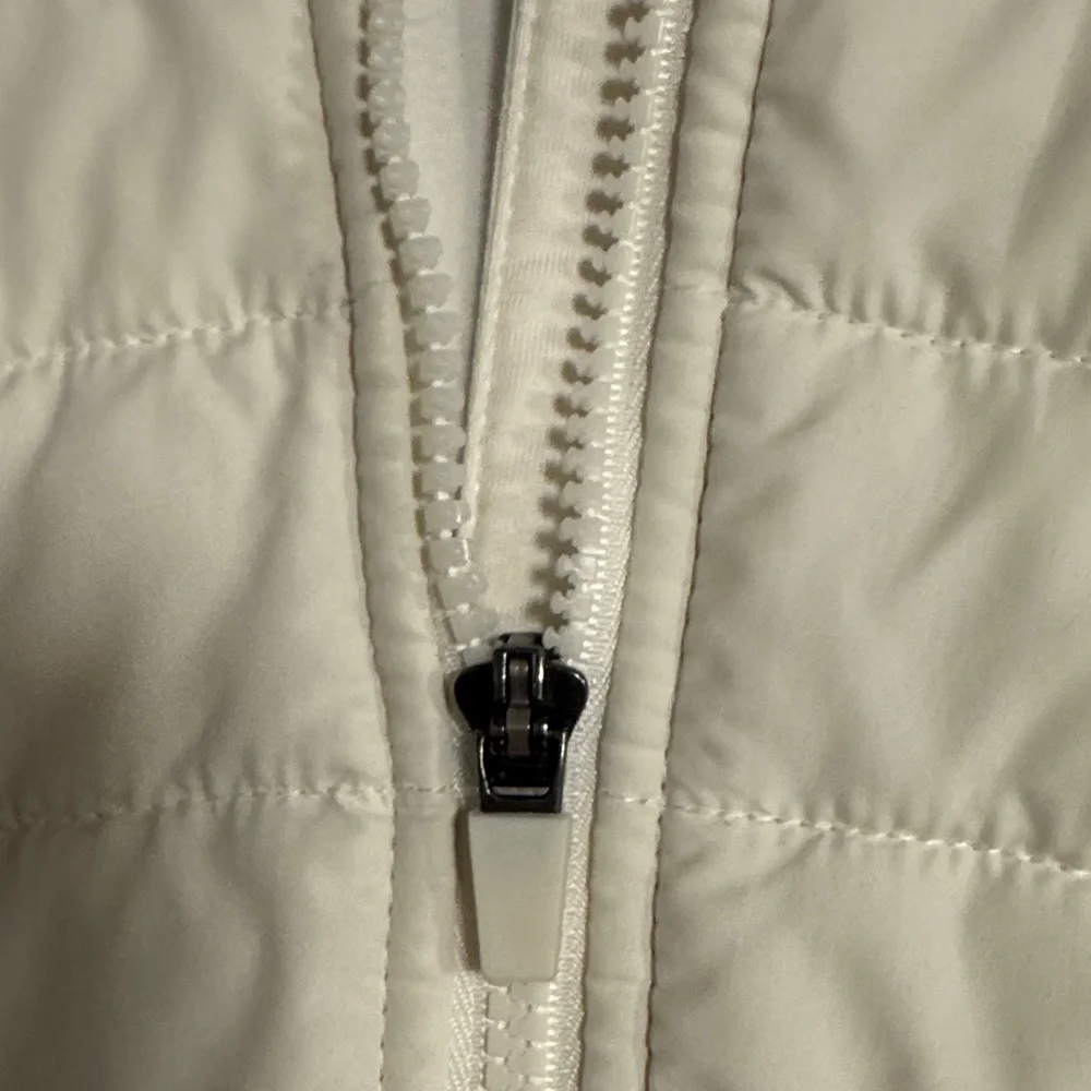ASICS Women's Off-White Quilted Vest